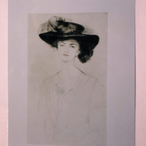 An old portrait of a woman wearing a large hat with a feather, displayed in a simple rectangular frame.
